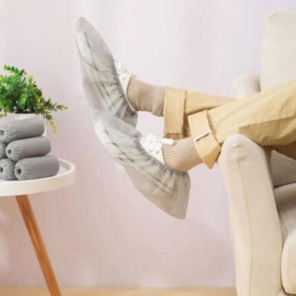 Gray new disposable thickened nonwoven shoe covers for indoor use, anti-slip, wear-resistant, dustproof foot covers for adults,students, and children